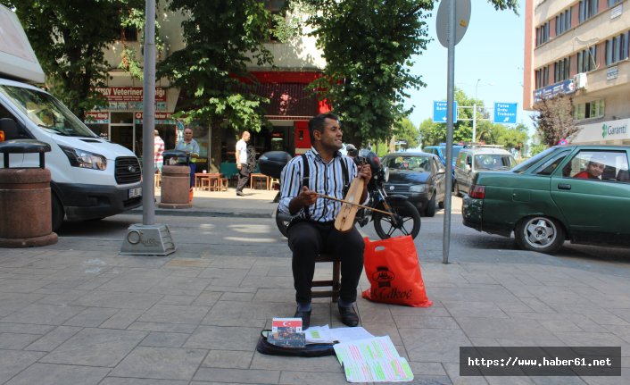 Ozan gibi sokak sanatçısı