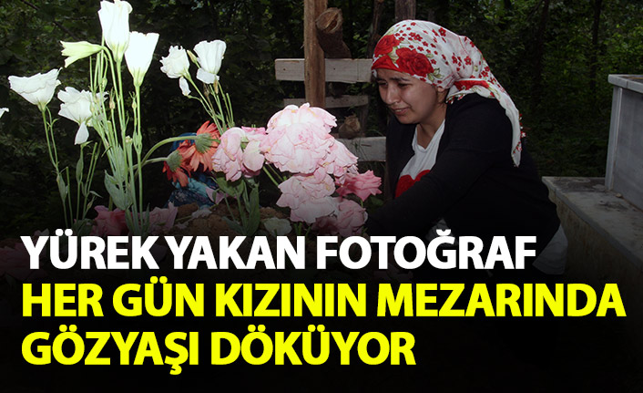 Yürek yakan fotoğraf! Hergün kızının mezarında göz yaşı döküyor