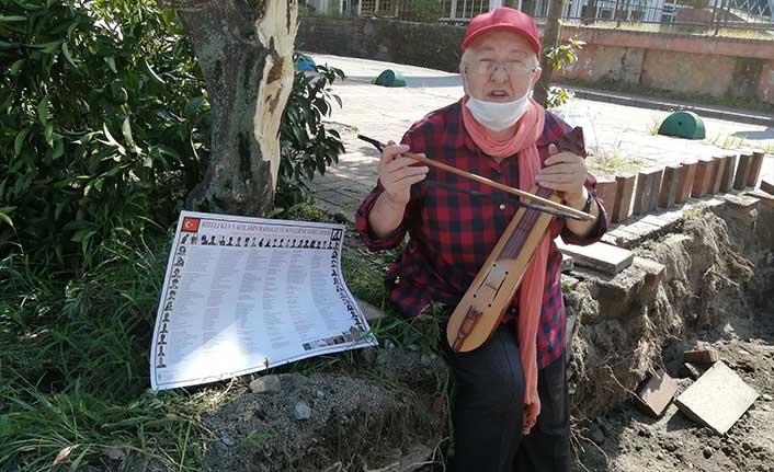 Rize'de mahalleye adını veren ağaçların budanmasını kemençesi ile protesto etti