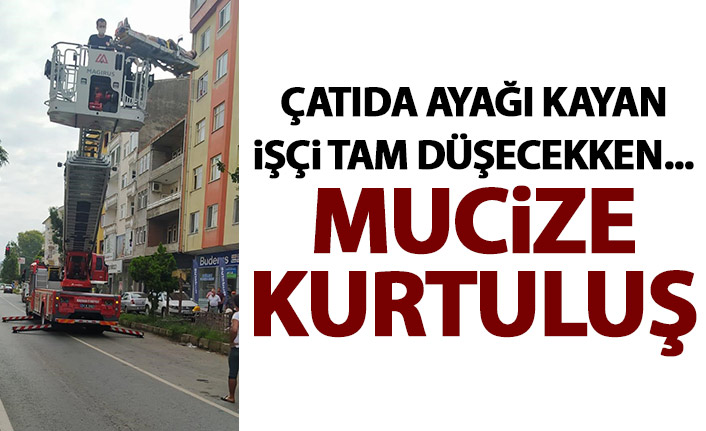 Çatıda ayağı kayan işçinin mucize kurtuluşu