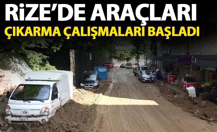 Rize'de moloz yığınların altında kalan araçlar çıkartılıyor