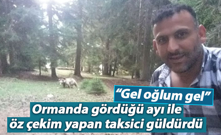 Ormanda gördüğü ayı ile öz çekim yapan taksici güldürdü