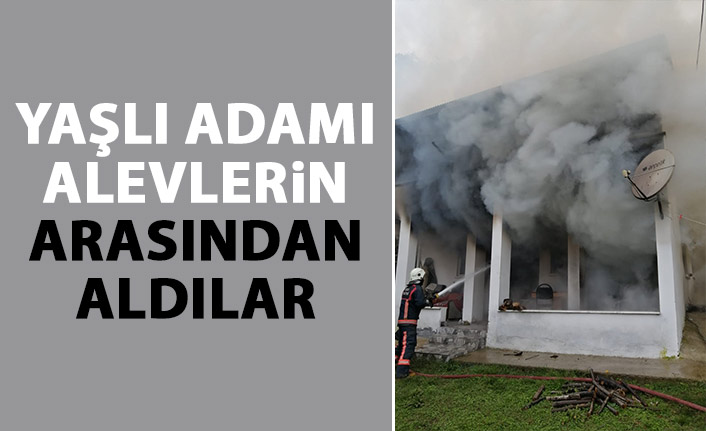 Yaşlı adam alevlerin arasından kurtarıldı