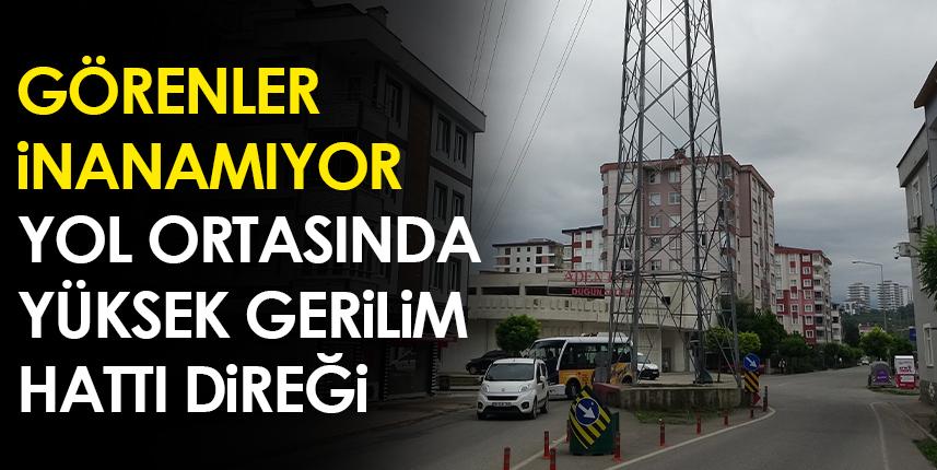 Ordu'da yol ortasındaki yüksek gerilim hattı direği, görenleri şaşırtıyor