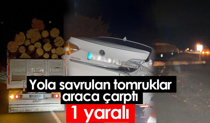 Gümüşhane'de yola savrula tomruklar araca çarptı:1 yaralı