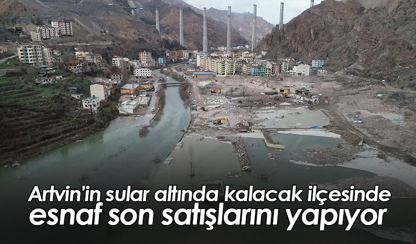 Artvin'in sular altında kalacak ilçesinde esnaf son satışlarını yapıyor