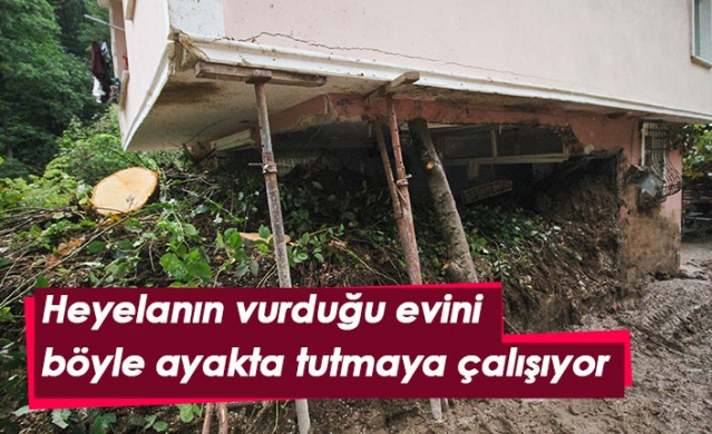 Heyelan vuran evini demir çubuklarla ayakta tutmaya çalışıyor.