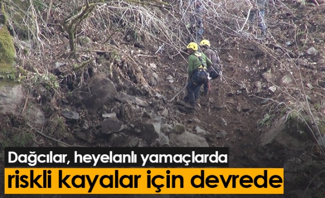 Dağcılar, heyelanlı yamaçlarda riskli kayalar için devrede. Foto Haber