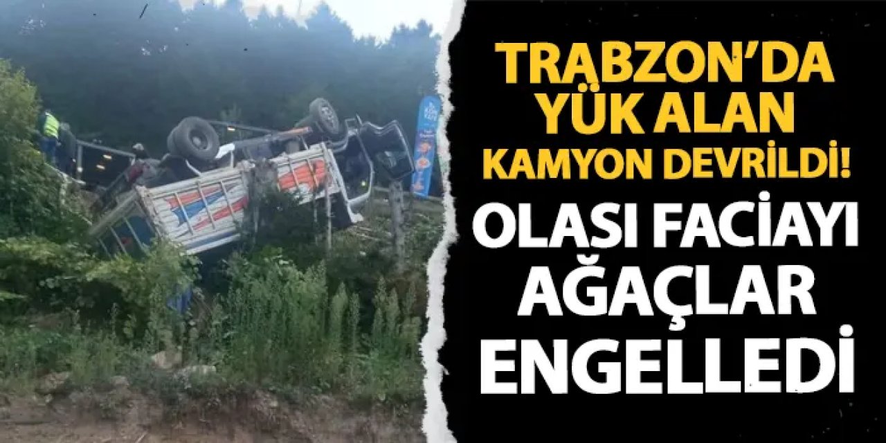 Trabzon'da yük alan kamyon devrildi! Olası faciayı ağaçlar engelledi